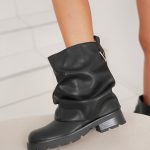Bottines femme noires à revers plié tendance avec semelle crantée épaisse